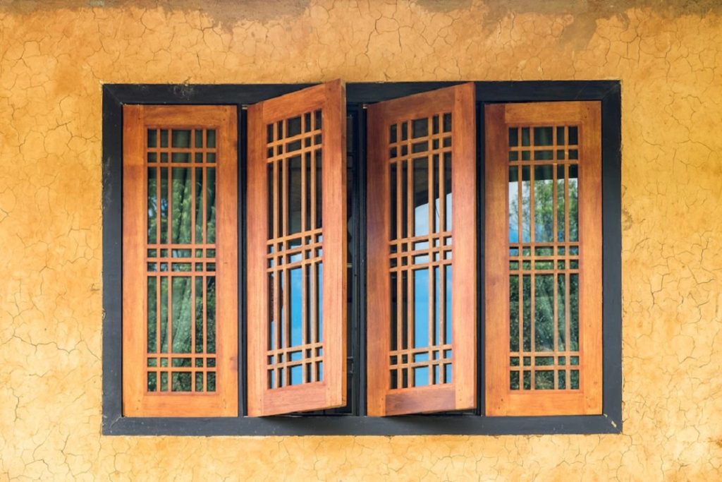 vintage-wooden-window-yellow-crack-wall_49071-5270